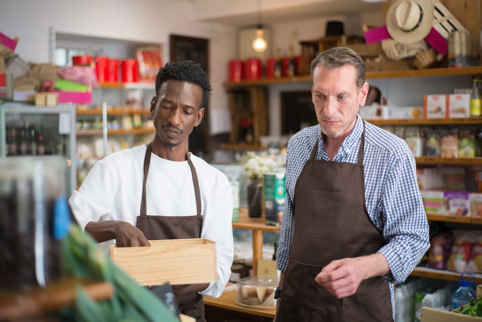 men organizing the products in a retail shop 