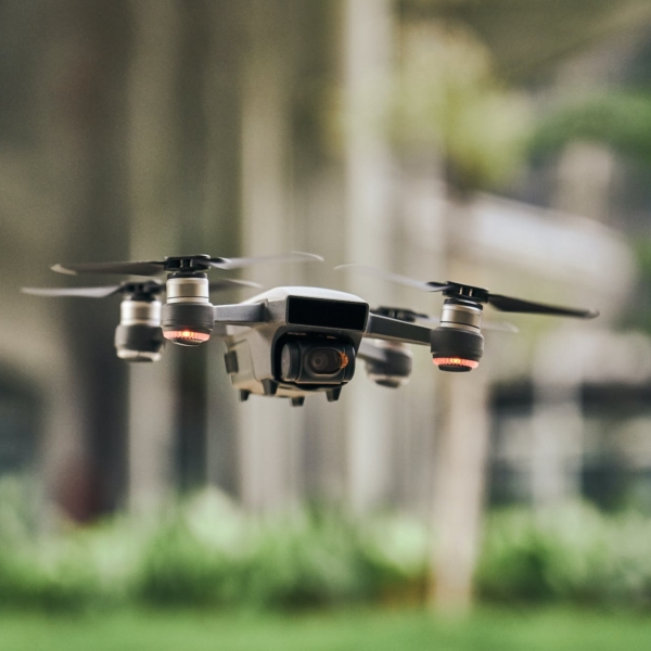 black and silver drone quadcopter