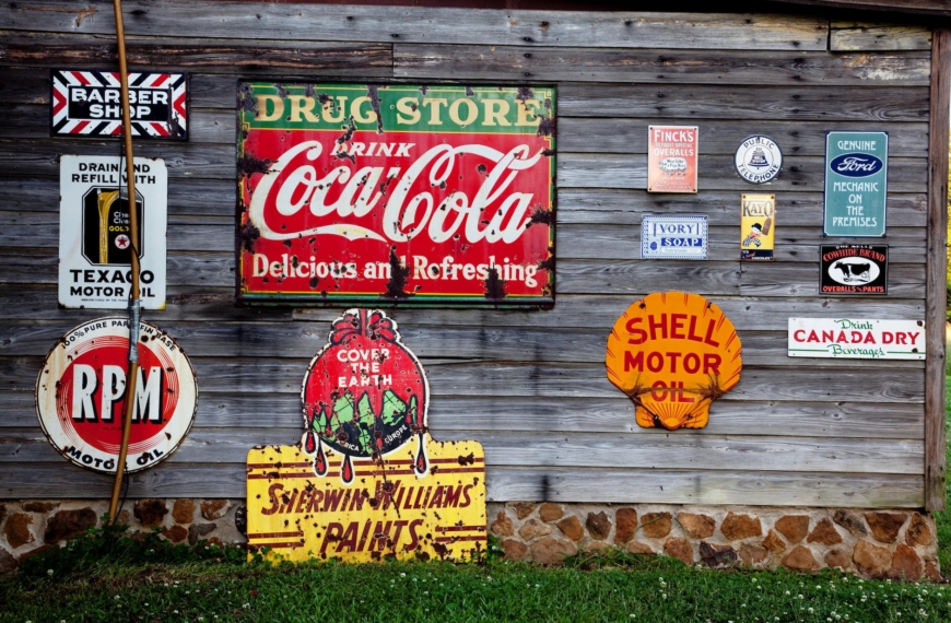 drug store drink coca cola signage on gray wooden wall