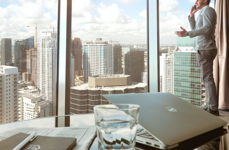 man taking to mobile phone