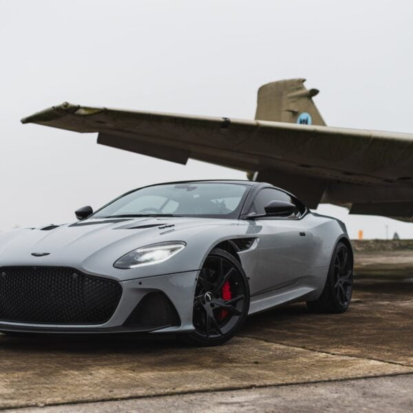 a car parked beside airplane