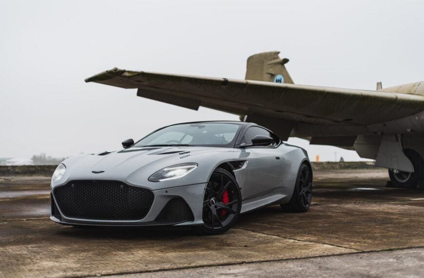 a car parked beside airplane