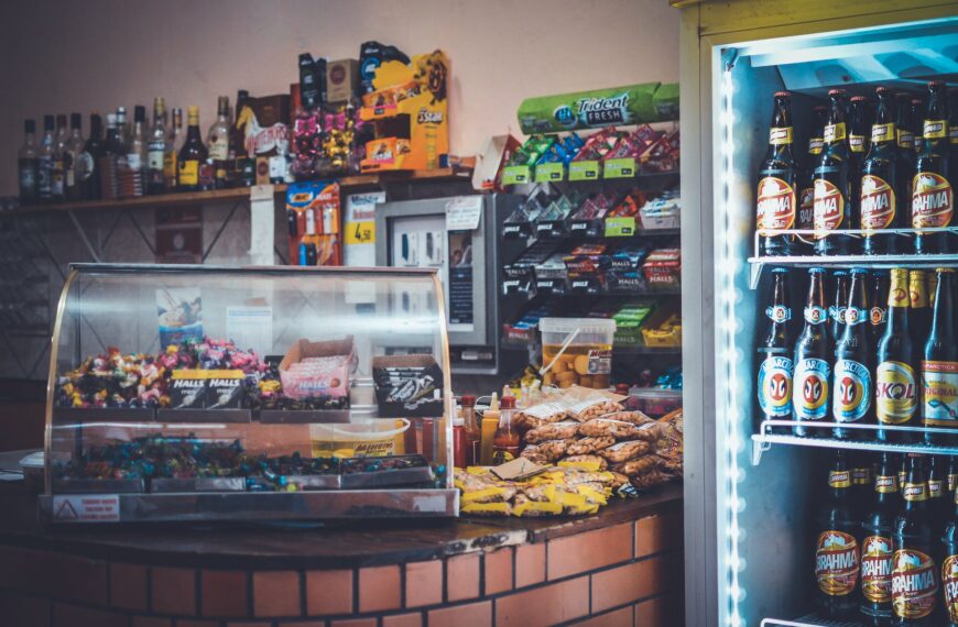 silver display shelf on brown sectional table