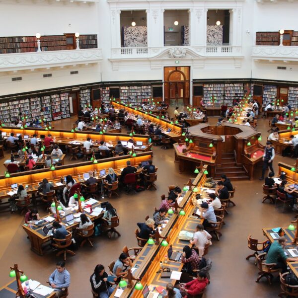 people sitting inside well lit room