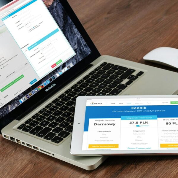 ipad on macbook pro beside apple magic mouse
