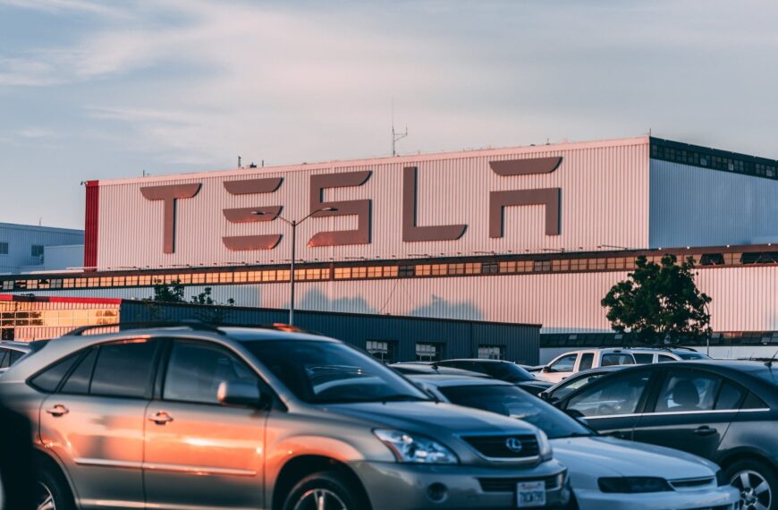 cars parked in front of company building