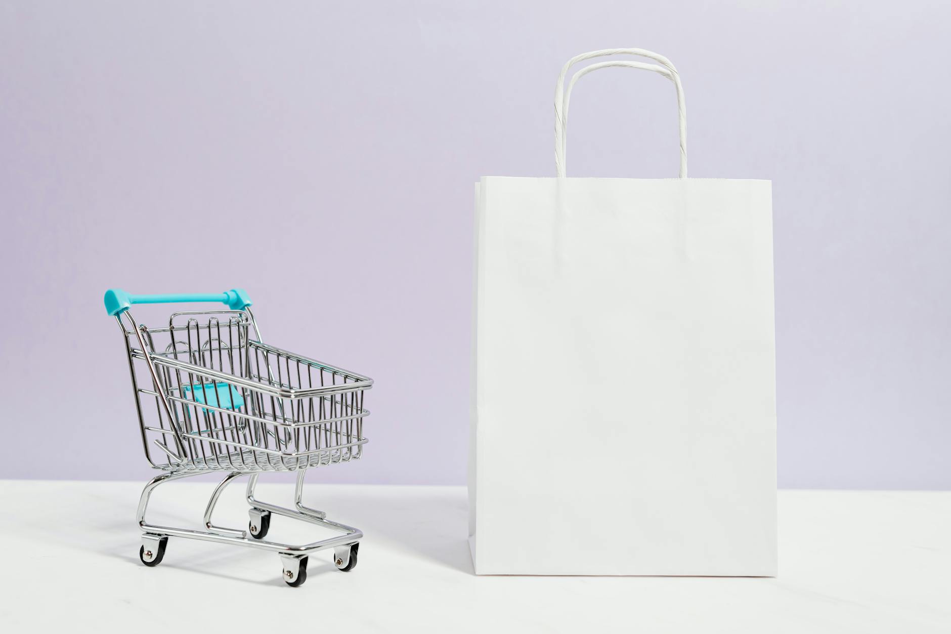 push cart and a white paperbag