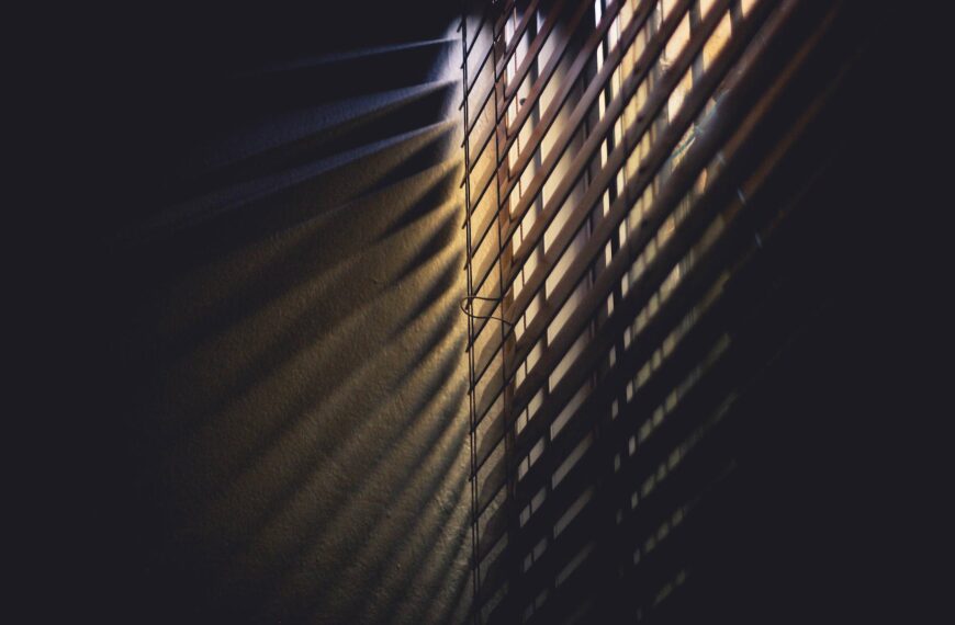 low light photography of brown window blinds