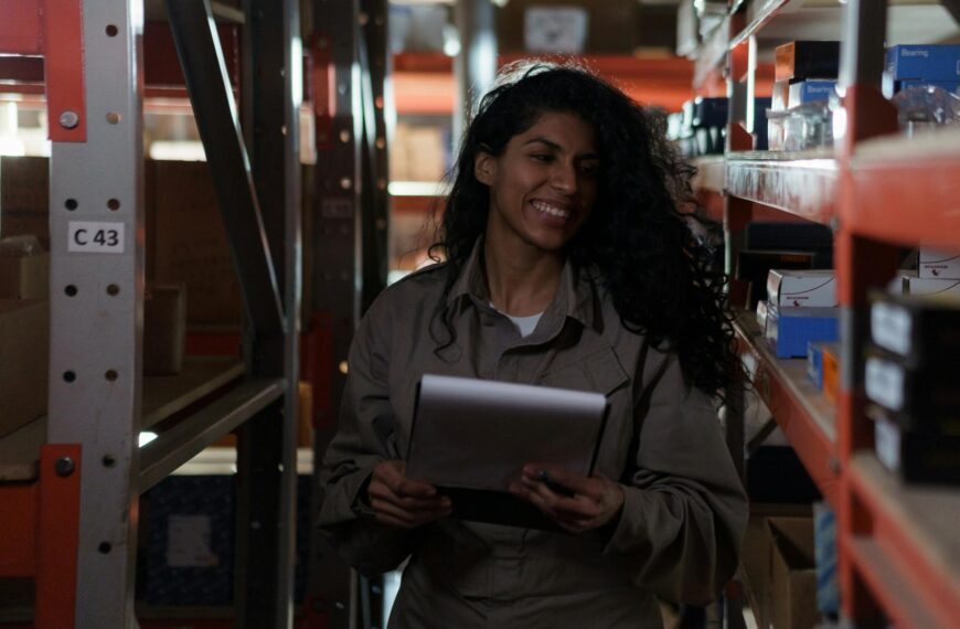 a woman on an aisle holding a clipboard