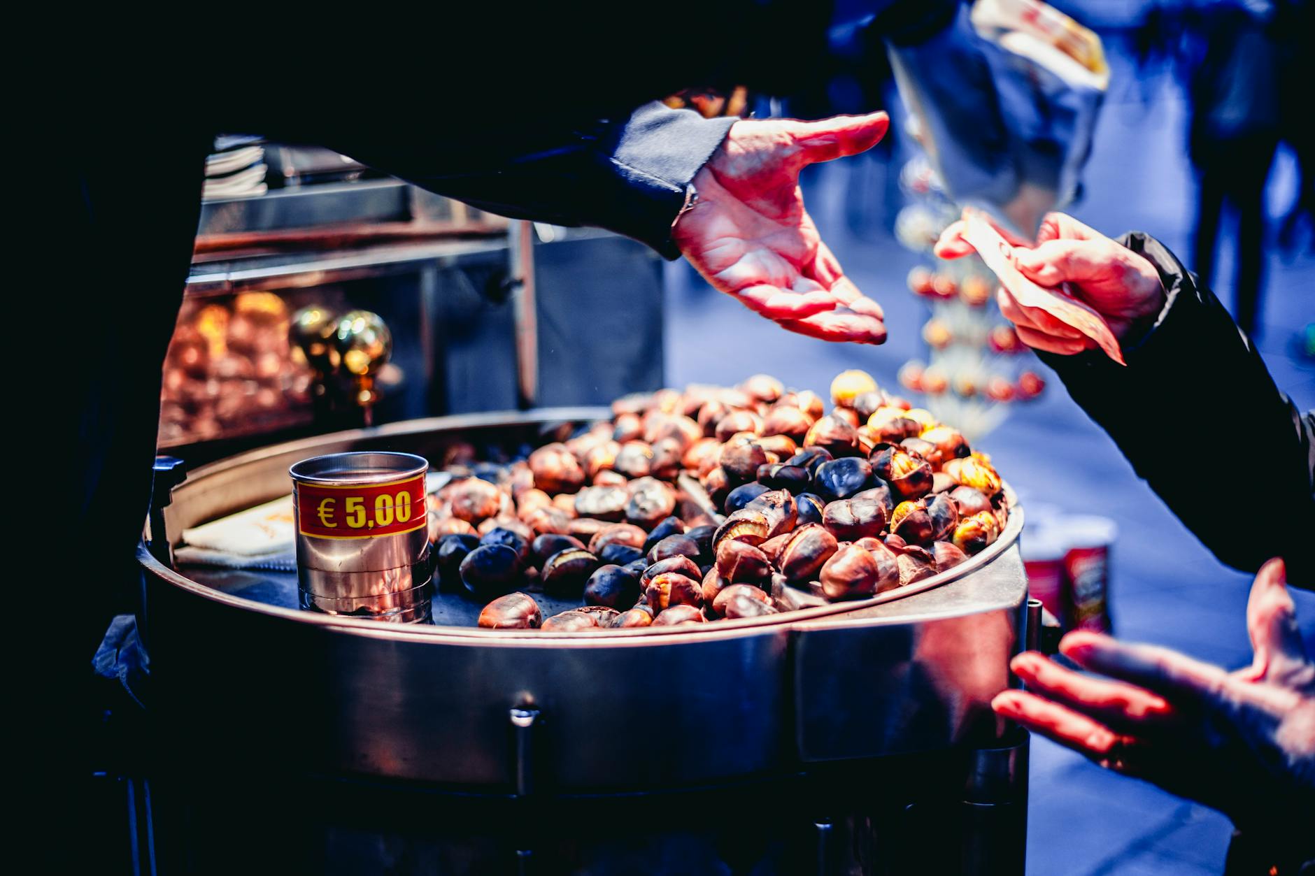 person paying bill in front of nuts