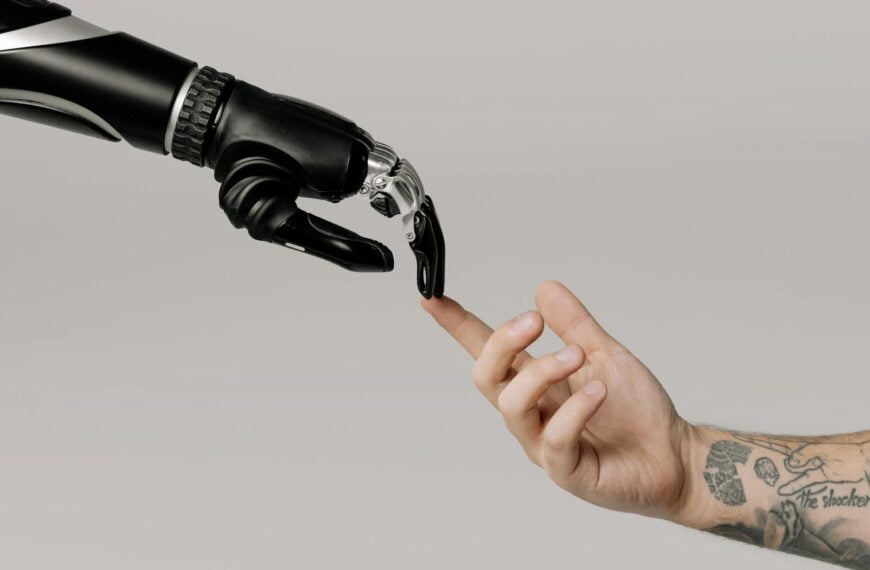 bionic hand and human hand finger pointing