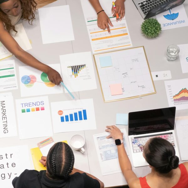 woman pointing on the white paper