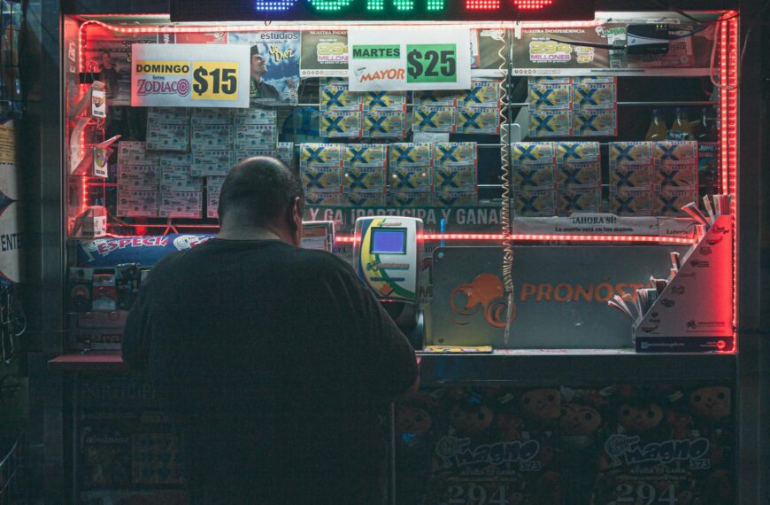 photo of man buying a lottery voucher