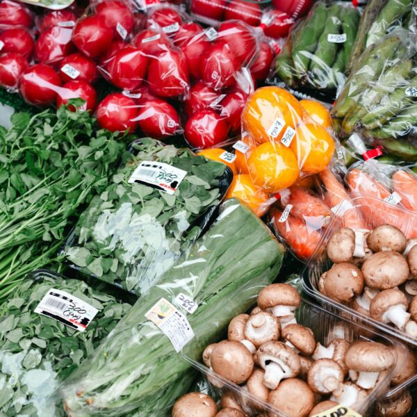 a display of vegetables and fruits at a market