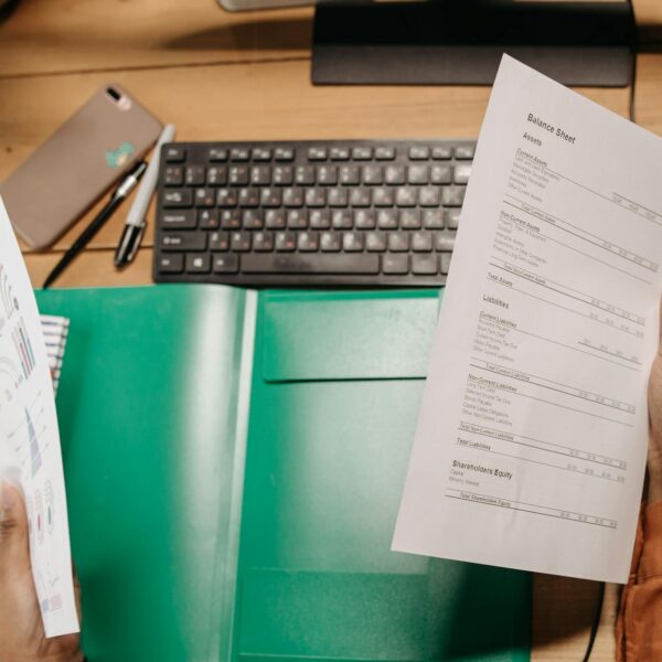 a person holding a financial statement