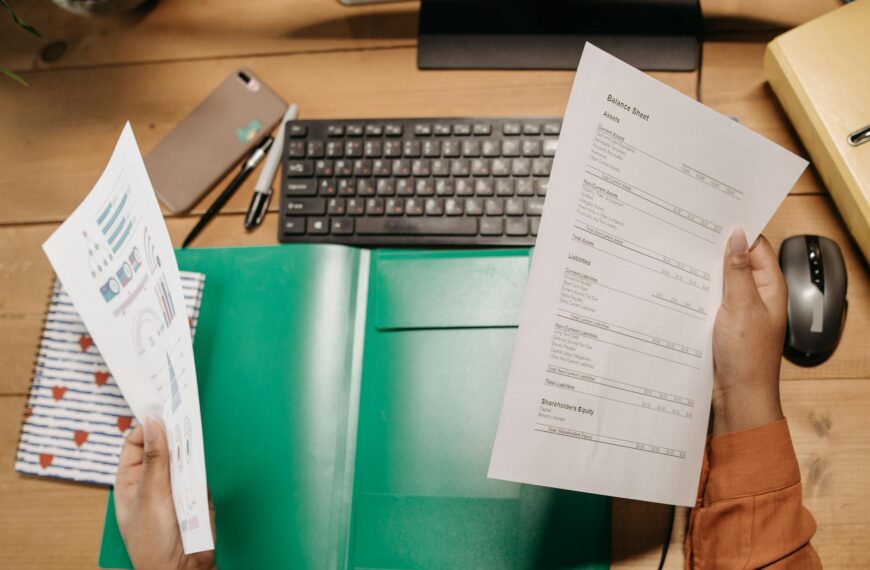 a person holding a financial statement