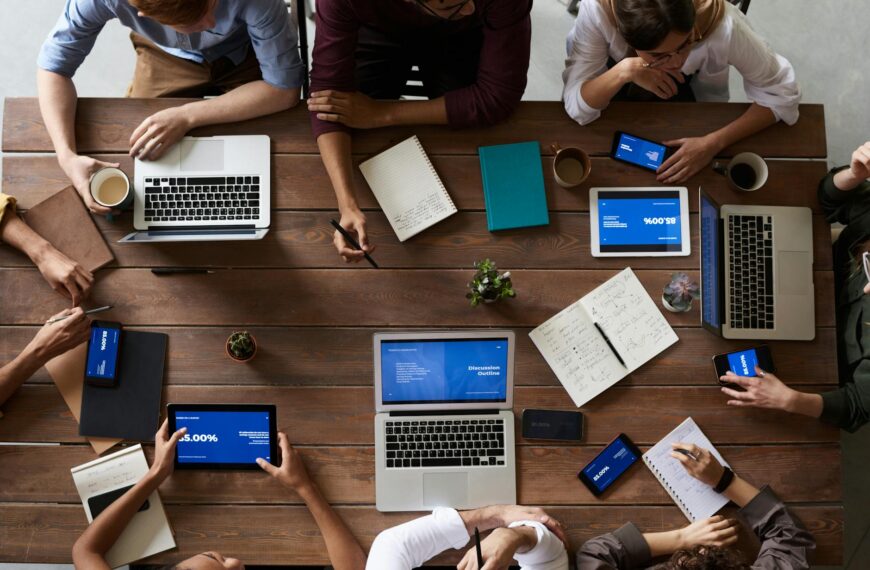 top view photo of people near wooden table